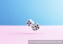 Two dice over pink and blue background 5ayAo5