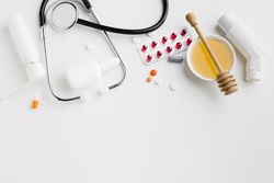 Asthma inhaler with medical treatment honey with copy space