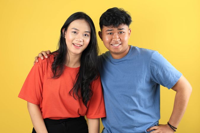 Lovely Young Happy Smiling Asian Couple in T Shirt Clothes