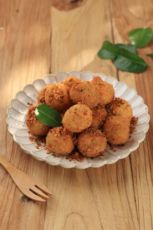 Cimol is Tapioca Balls with Chewy Texture, Topped with Chili Powder and Dry Lime Leaves.
