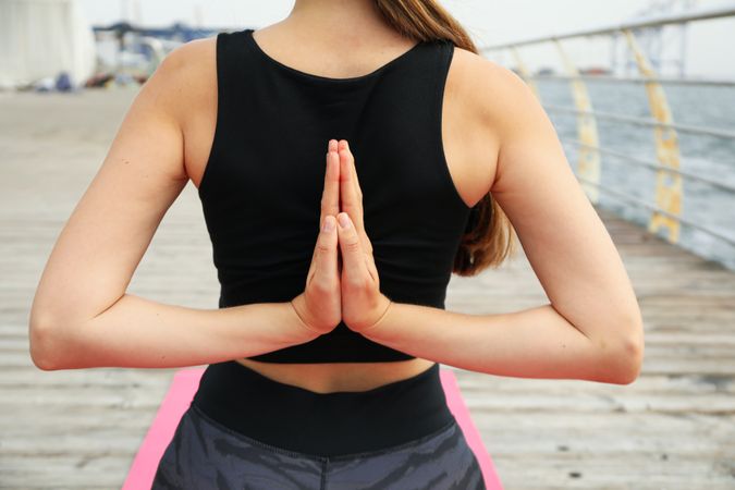 Yoga outdoor with young woman, concept of health and body care