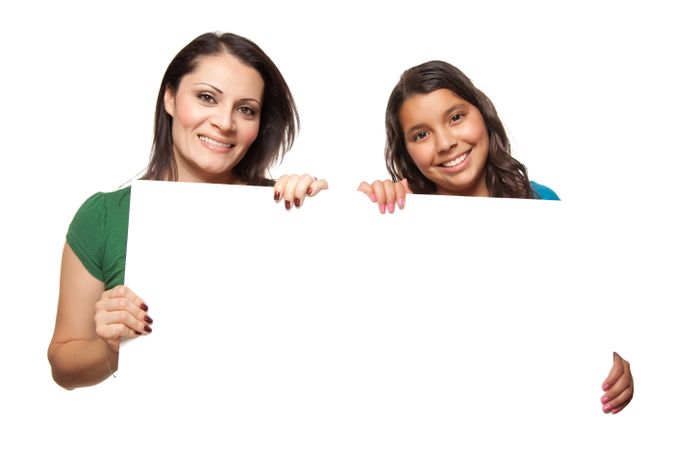 Hispanic Girl and Mother Holding Blank Board
