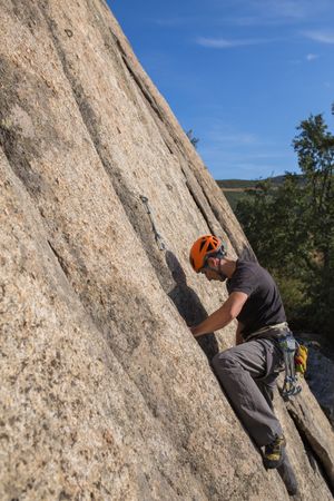 Man climbing a rock