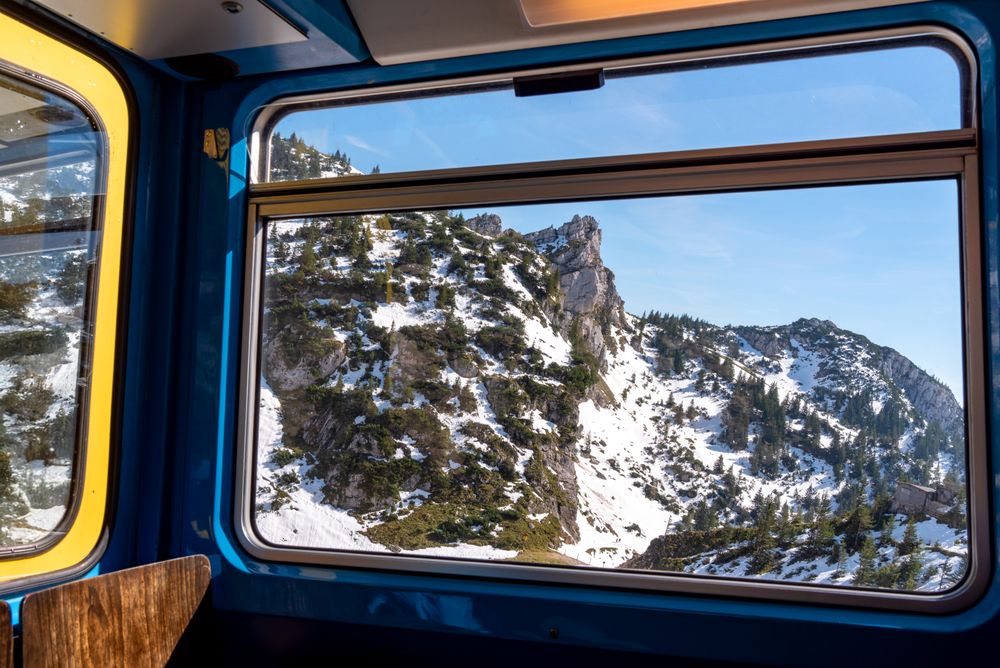Mountain peak window view from a cog railway in the Bavarian Alps, Germany