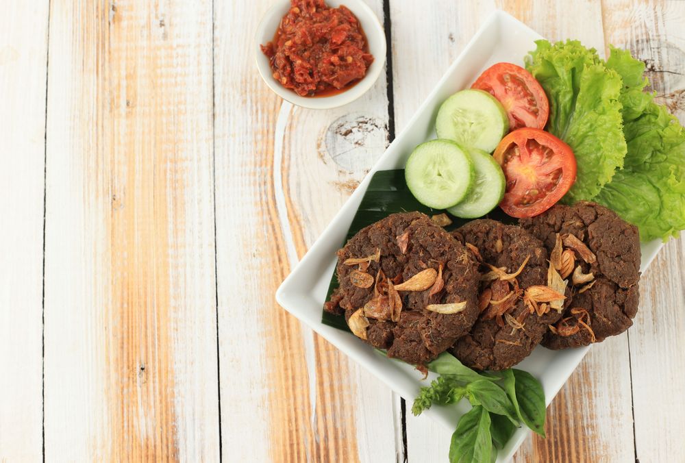 Top view of Indonesian spiced fried meat, empal