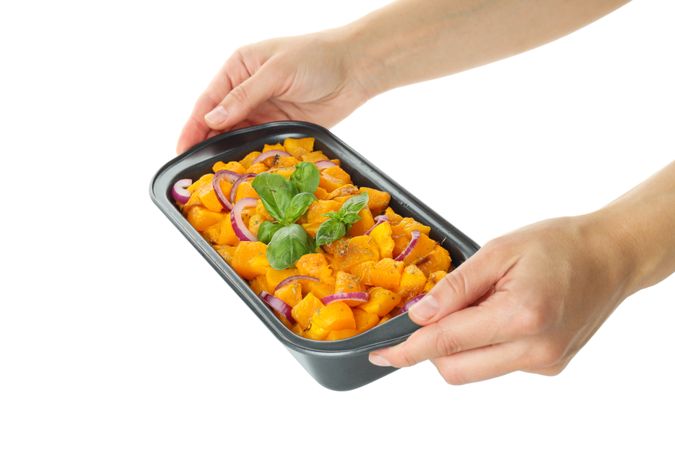 Baked pumpkin isolated on light background