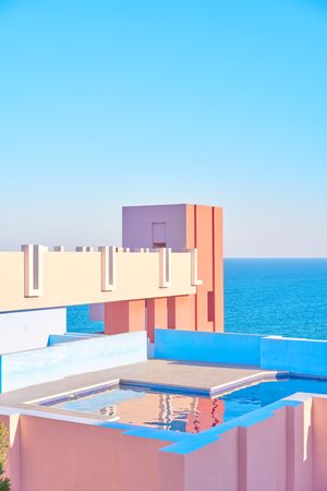 Compact pool on roof of building of geometric shapes