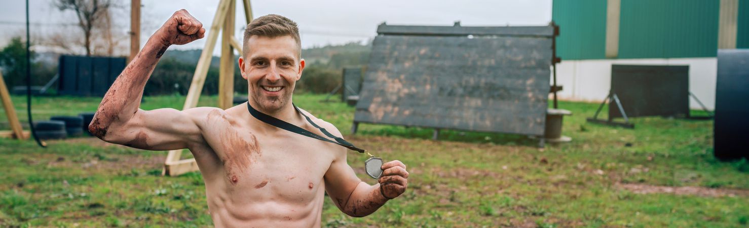 Athlete showing medal after race