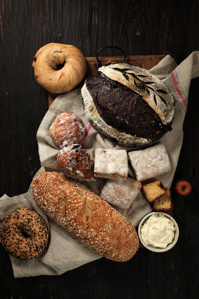 Top View Assortment Bakery Product on Black Wooden Background