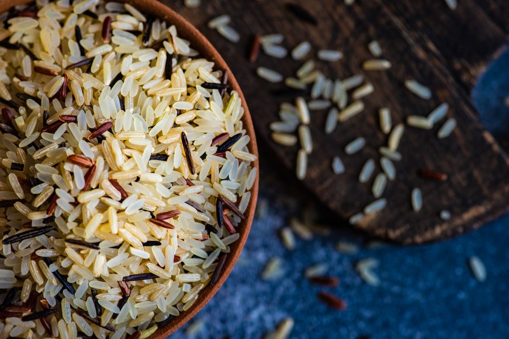 Close up of bowl of dried rice grains