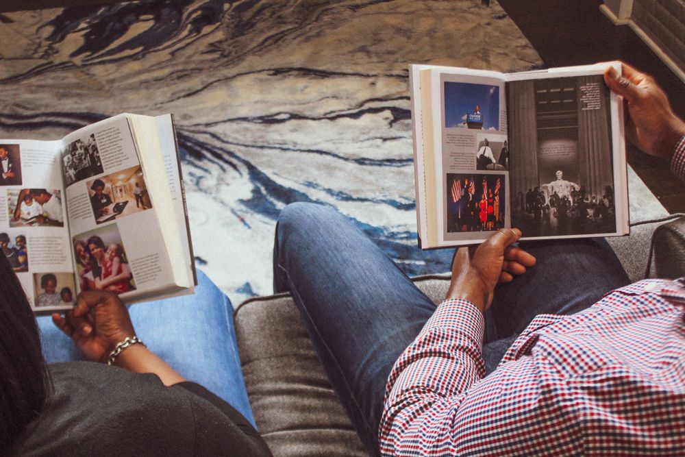 Man and woman reading books
