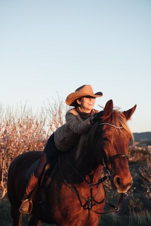 Woman riding horse