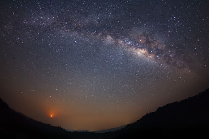 Night photography in Phitsanulok. Milky way galaxy with moon and space dust in the universe