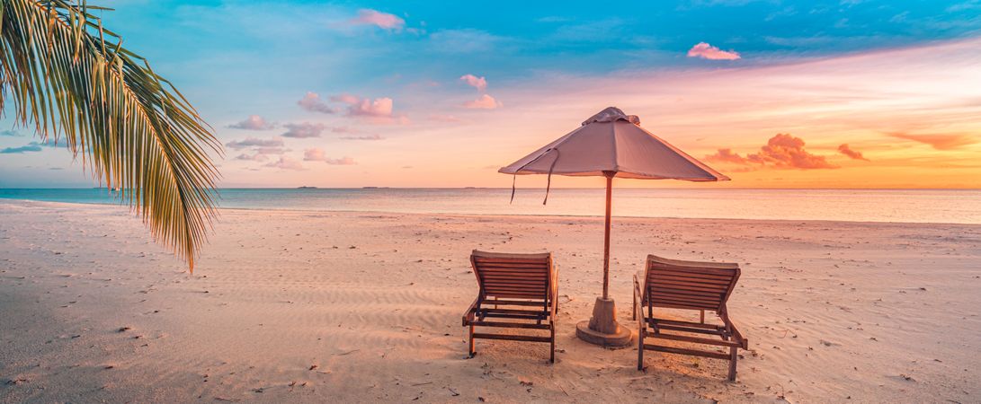 Wide shot of reclining chairs over looking the ocean