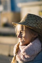 Cheerful girl looking away