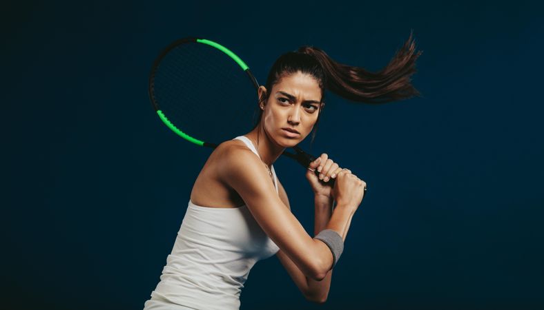 Sportswoman holding a tennis racket
