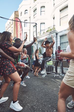 London, England, United Kingdom - August 25th, 2019: Man dancing surrounded by crowd