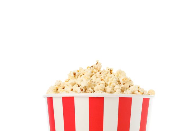 Striped bucket with popcorn isolated on blank background
