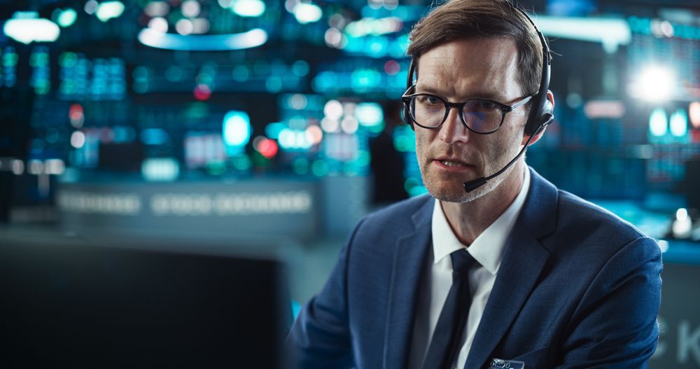 Close Up Portrait of a Smart and Thoughtful Stock Exchange Broker.