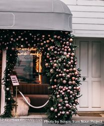Restaurant front decorated with Christmas baubles bGQ3B5