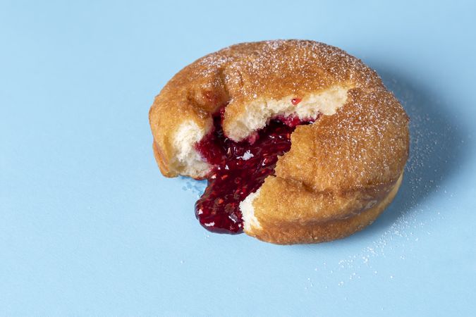 Doughnut filled with raspberry jam