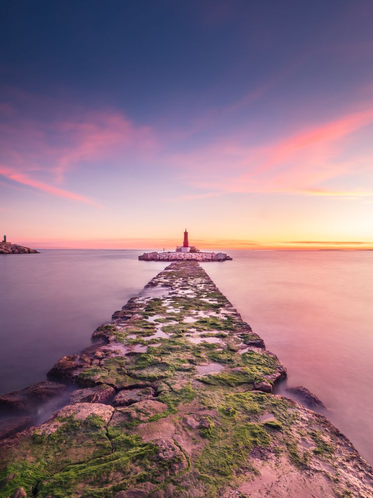 Rough path to islet with lighthouse