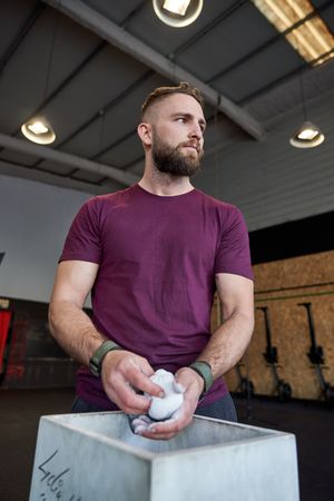 Confident sportsman preparing for training