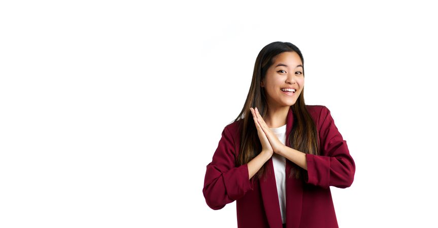 Portrait of a deeply moved Asian woman isolated