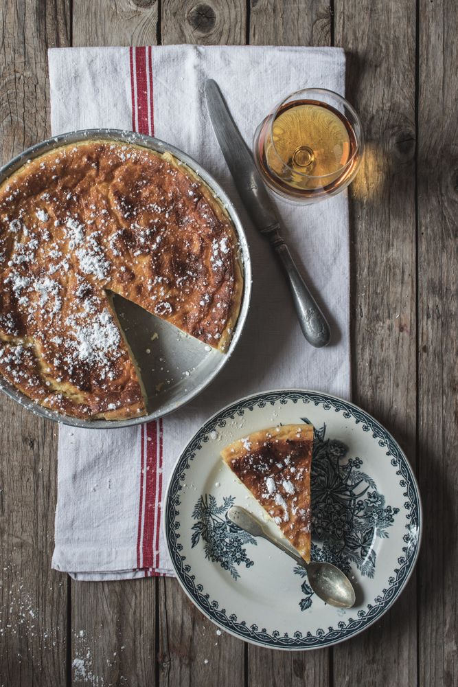Cottage cheese pudding and glass of cognac