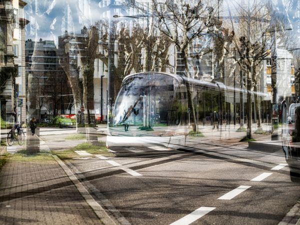 Unusual view of the city. Disappearing trams on the streets of the city of Strasbourg.