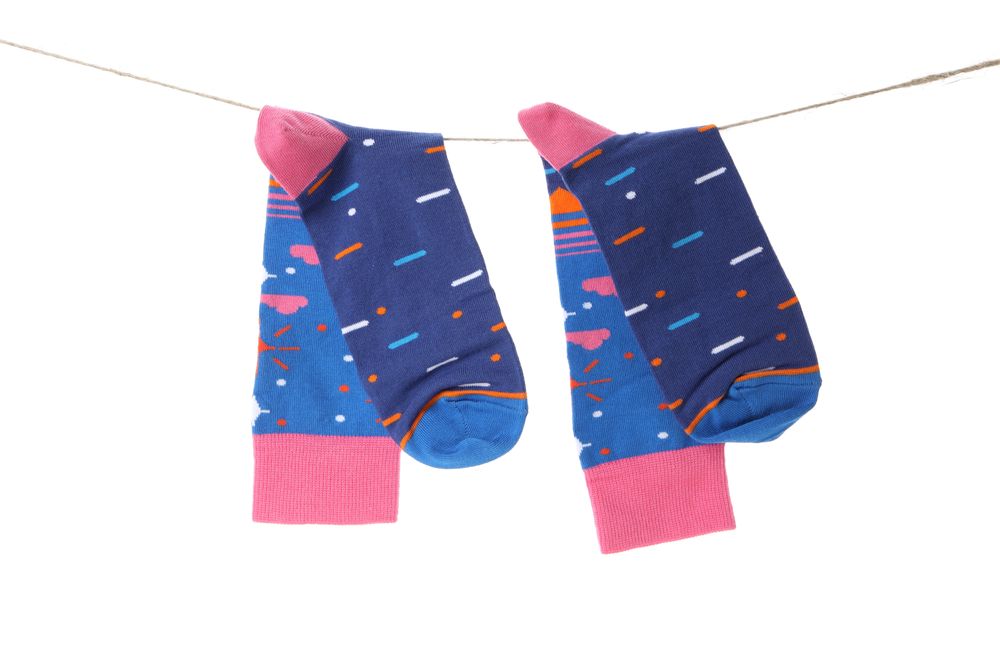 socks with a bright print on the lace, isolated on a light background.