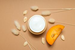 Concept of different cosmetic products, Pumpkin cosmetics, top view