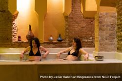 Women bathing together in Arabic bathhouse 47KQB4