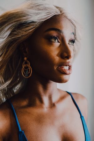 Charming Black woman in blue trendy dress