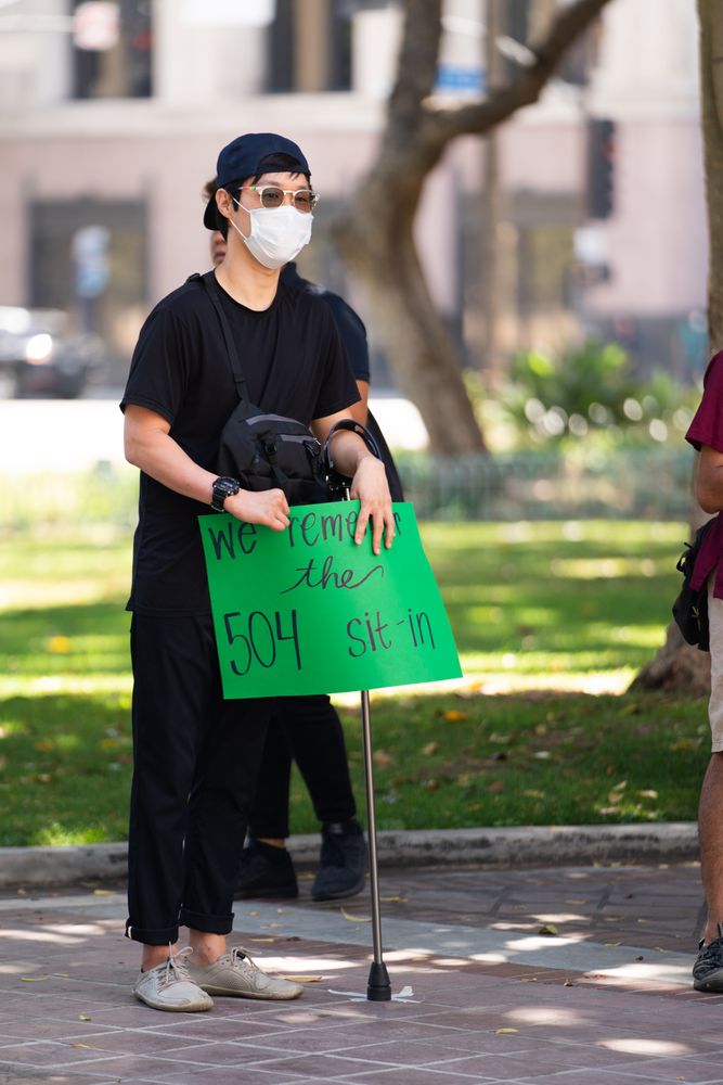 Los Angeles, CA, USA — June 16th, 2020: man with cane at solidarity rally for Black lives matter