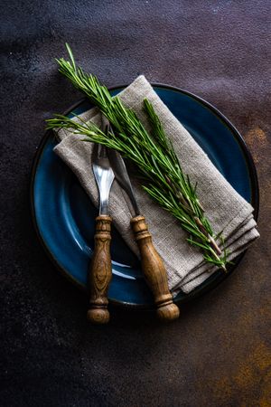 Cutlery set with fresh rosemary