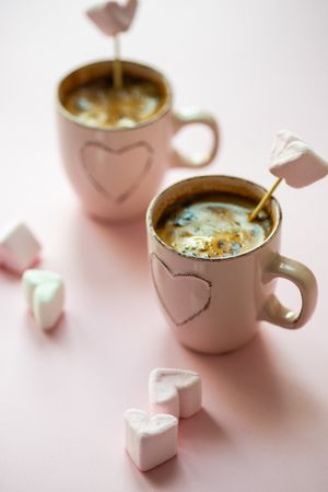 St. Valentines concept with marshmallow drinks in mugs