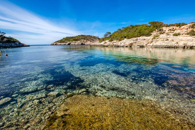 Cala Portinax bay with beautiful azure blue sea water