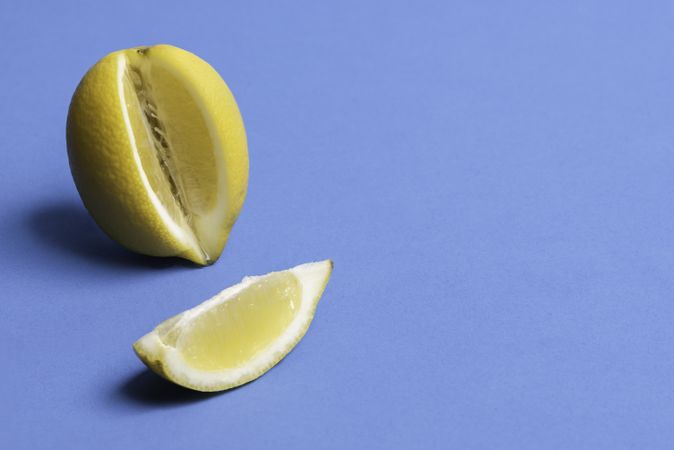 Ripe lemon and one slice of lemon