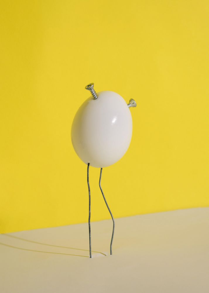 Hard boiled egg with wire and nails