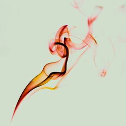 Swirls of bright red fume