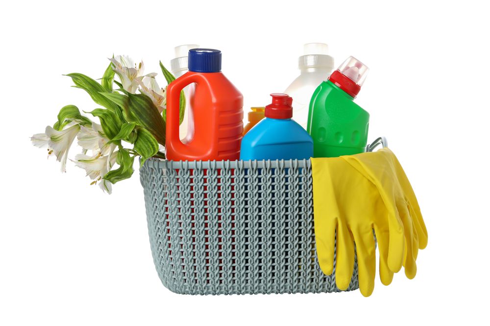 Detergents in a basket, isolated on plain background