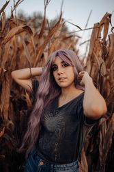 Casual woman in dry vegetation