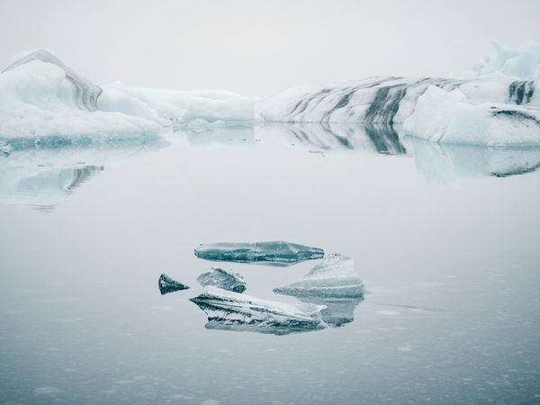 Ice on water between snow