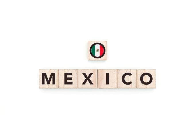Wooden blocks bearing the name and flag of Mexico.