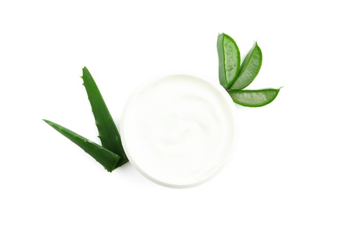Composition with natural treatment accessories isolated on blank background. Aloe vera
