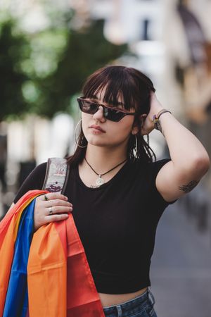 LGBT woman on city street