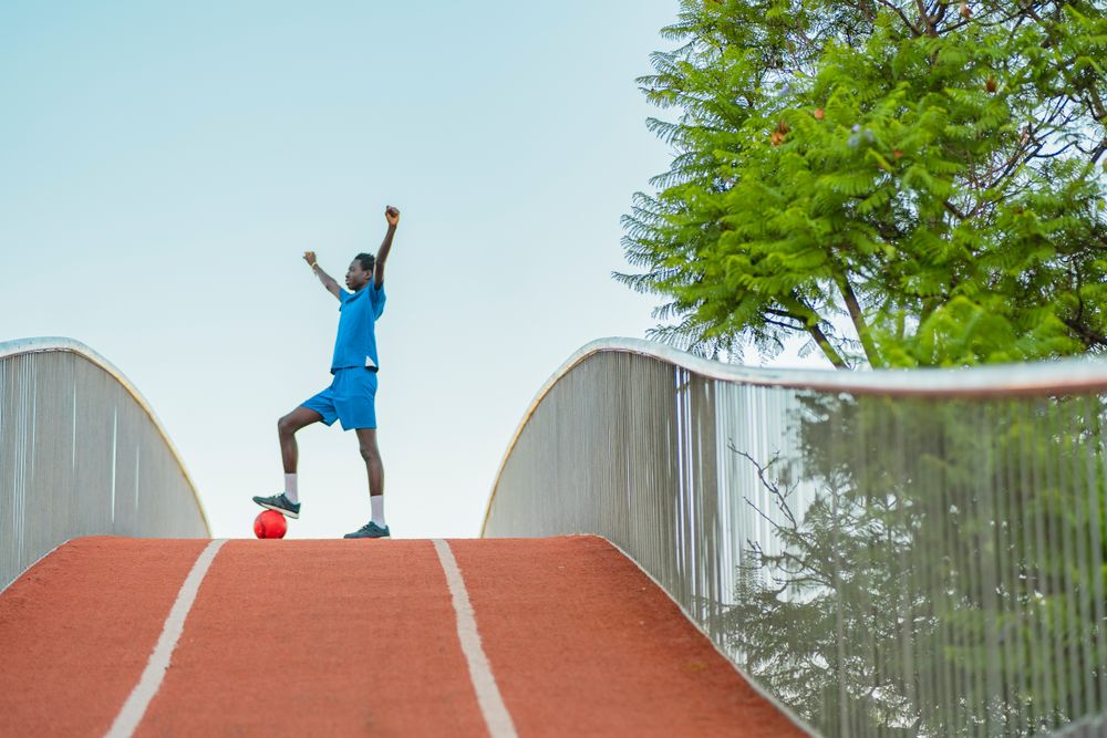 Black football player celebrating success