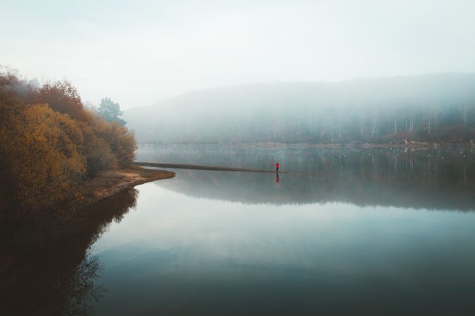 Beautiful tranquil lake in fog