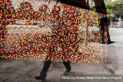 Reflection of mosaic as someone walks 5zVXn5